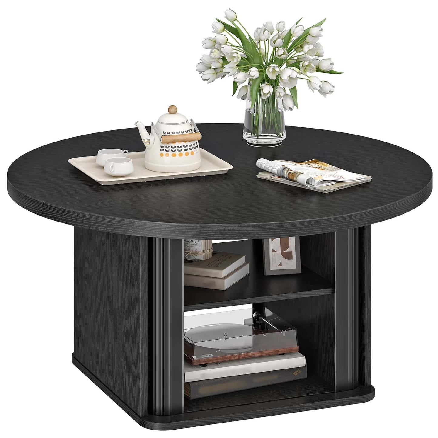 Round wooden coffee table in black with central storage shelves displaying books and decor.