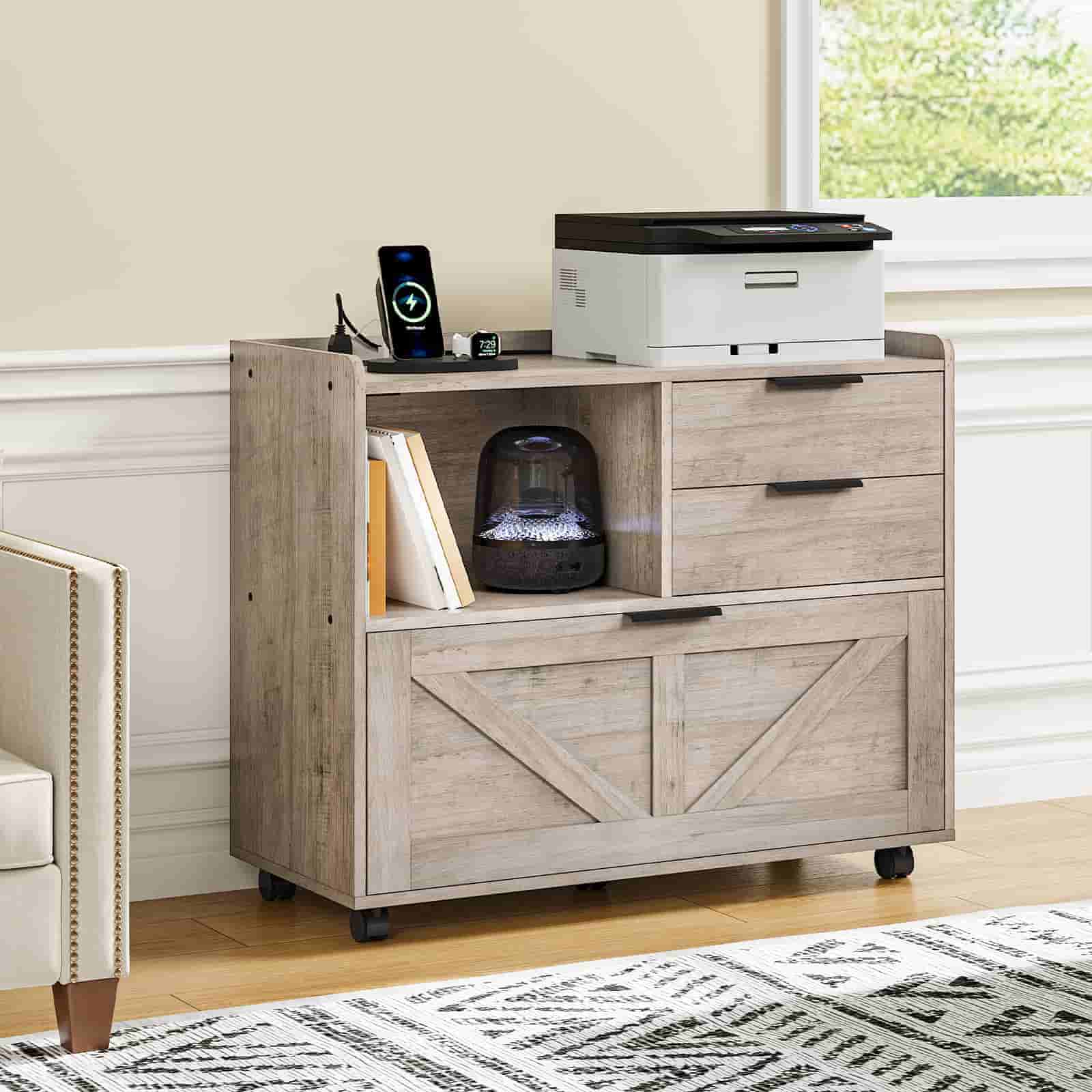 Farmhouse style grey wood printer holder cabinet neatly placed next to an office armchair.