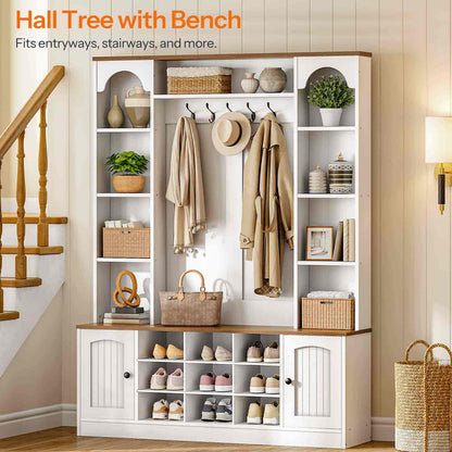 Beautiful home staircase hallway scene showcasing the rustic white hall tree bench holding family coats and shoes perfectly.