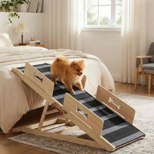 Wooden pet ramp with a dog on top in a bedroom setting