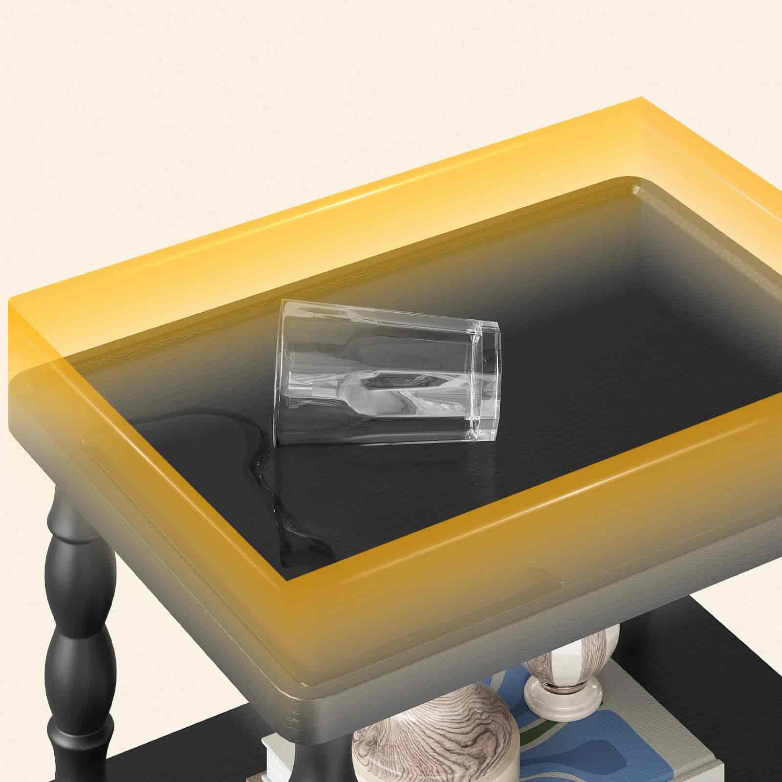 Yellow side table with a clear crystal on a white background