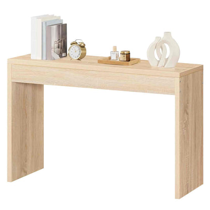 Light wooden desk with decorative items on a white background