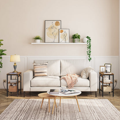 Modern living room with a beige sofa, coffee table, and decorative items.