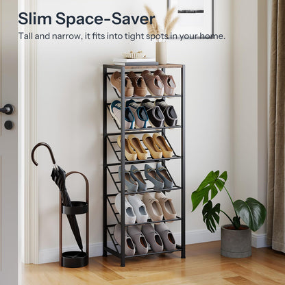 Skinny shoe holder stand blending seamlessly into a small apartment entrance next to an umbrella stand.