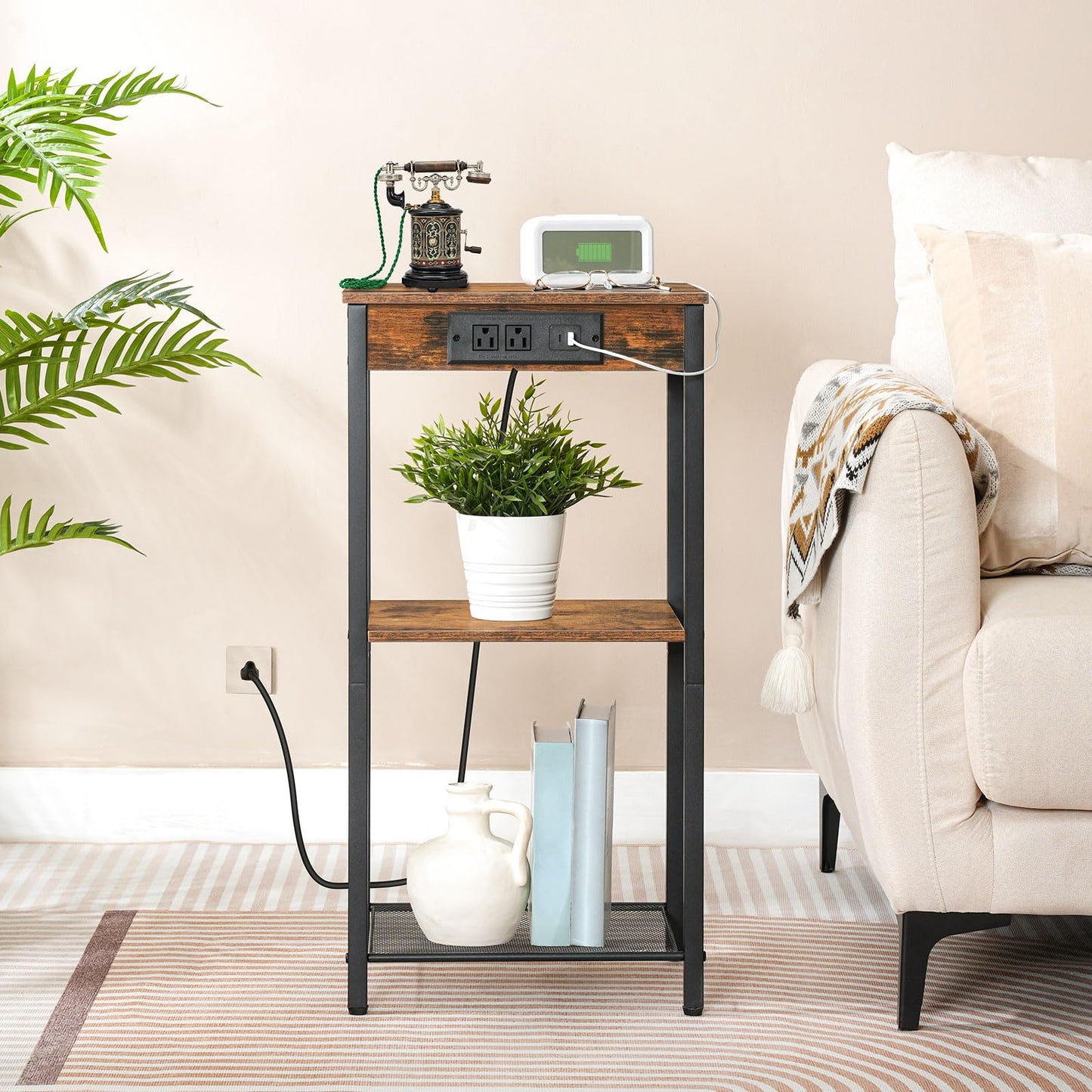 Slim sofa side table charging electronic devices seamlessly in a small apartment living room.