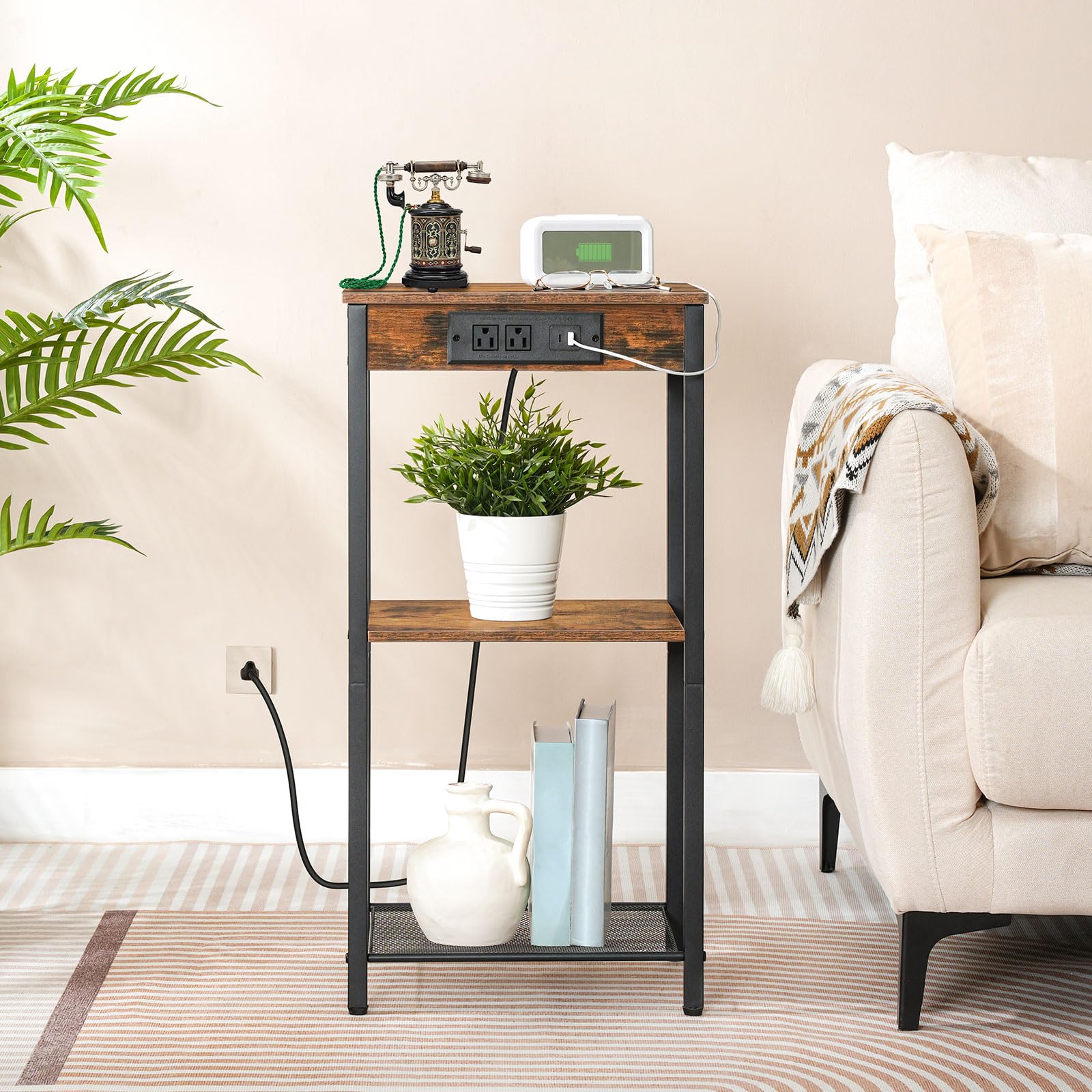 Slim sofa side table charging electronic devices seamlessly in a small apartment living room.