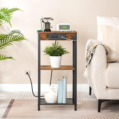 Slim sofa side table charging electronic devices seamlessly in a small apartment living room.