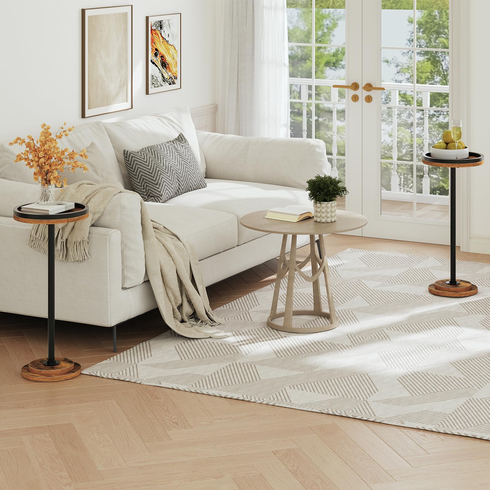 Cozy living room layout showcasing multiple slim tall accent tables styled around a white fabric sofa.