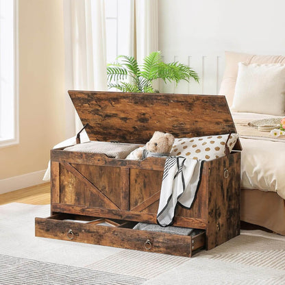 Wooden storage chest with a teddy bear and blanket in a bedroom setting