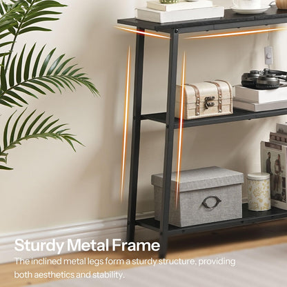 Close up of the sturdy slanted black metal frame wrapped with a decorative glowing warm yellow LED light strip