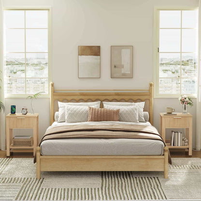 Wooden bed with bedding in a bright bedroom with large windows.