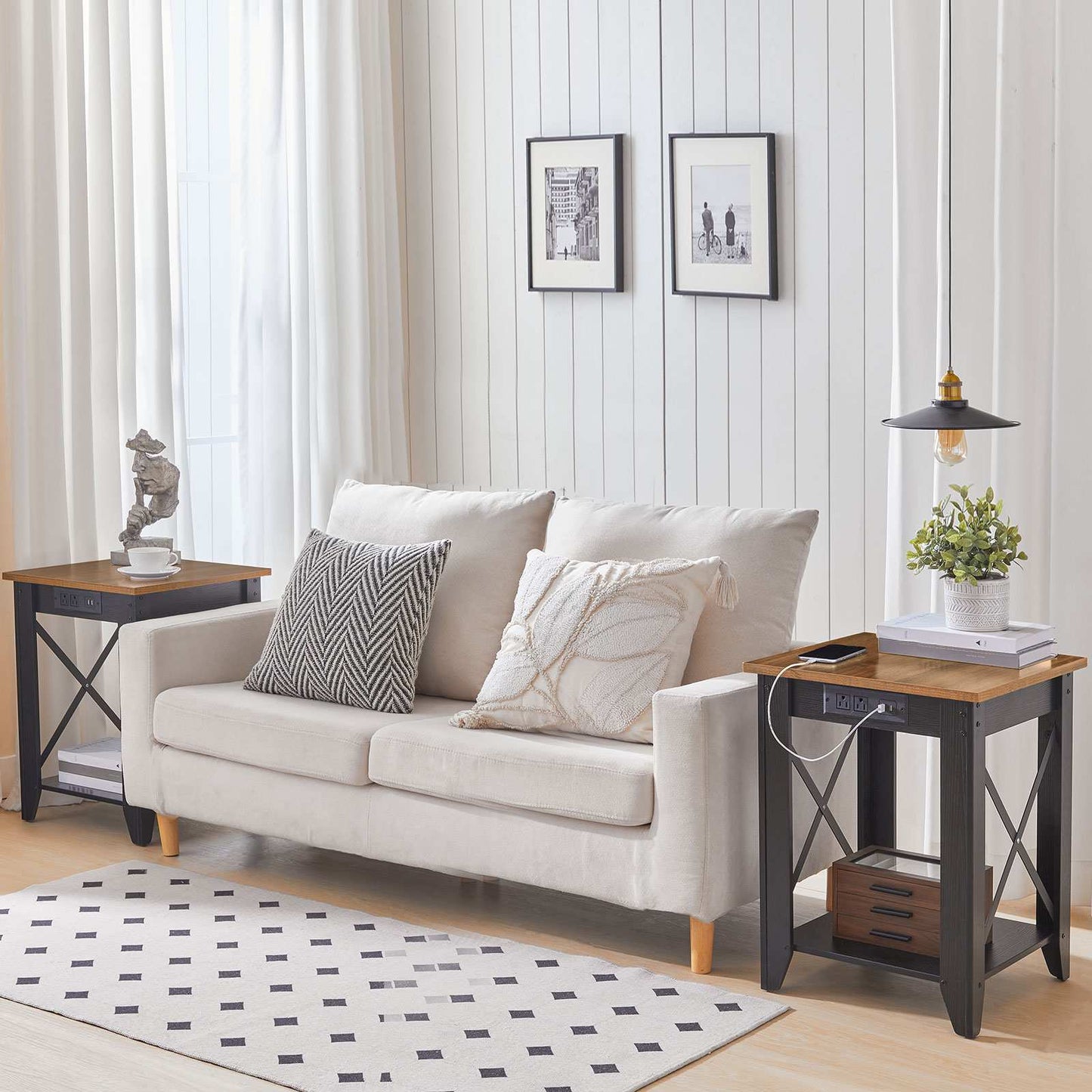 Bright modern living room environment view featuring two square industrial side tables positioned on both sides of a beige fabric couch.