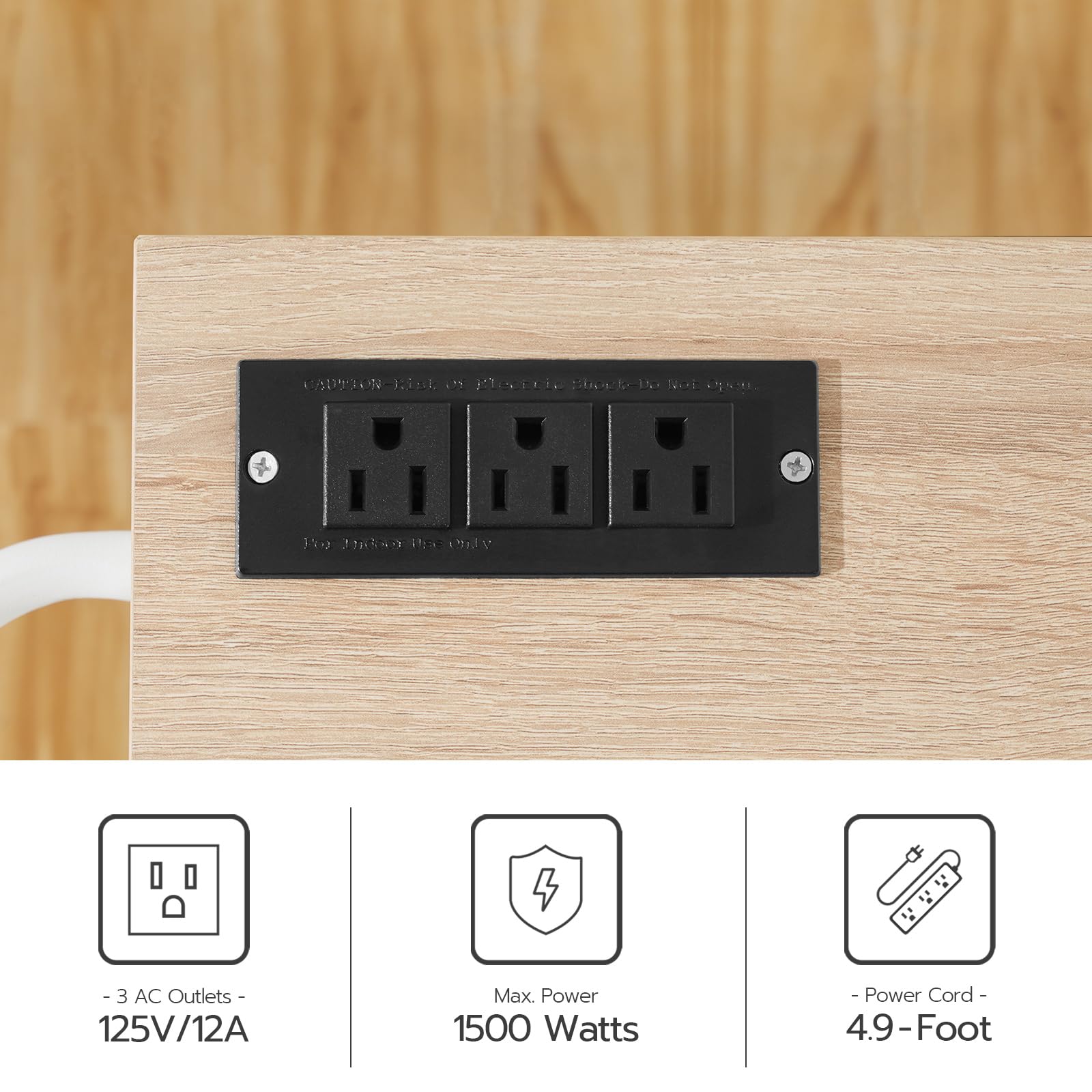 Close up of the embedded tabletop charging station showing 3 AC outlets and a 1500W high power output safety diagram.