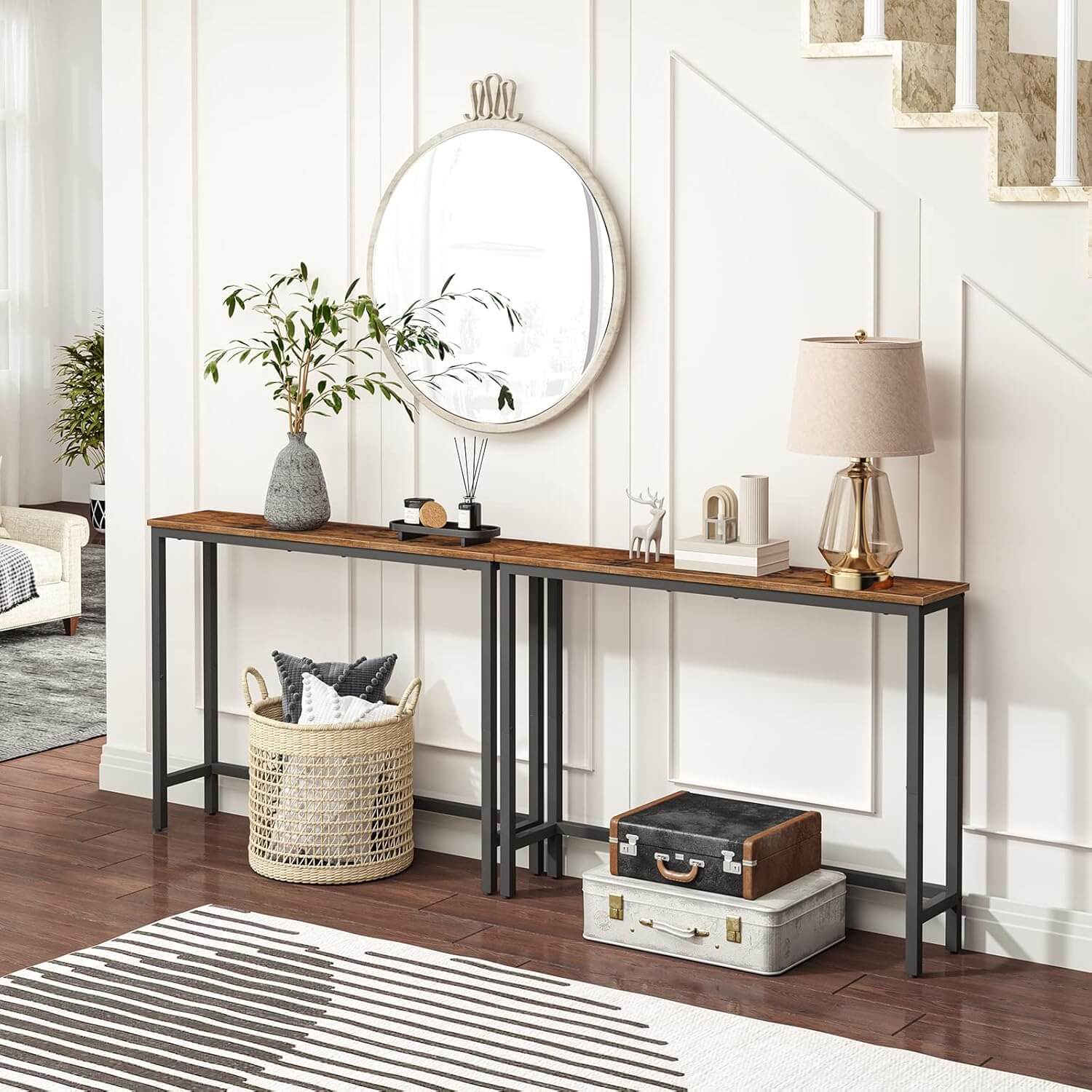 Two narrow entryway tables seamless alignment setup along a white hallway wall under a mirror