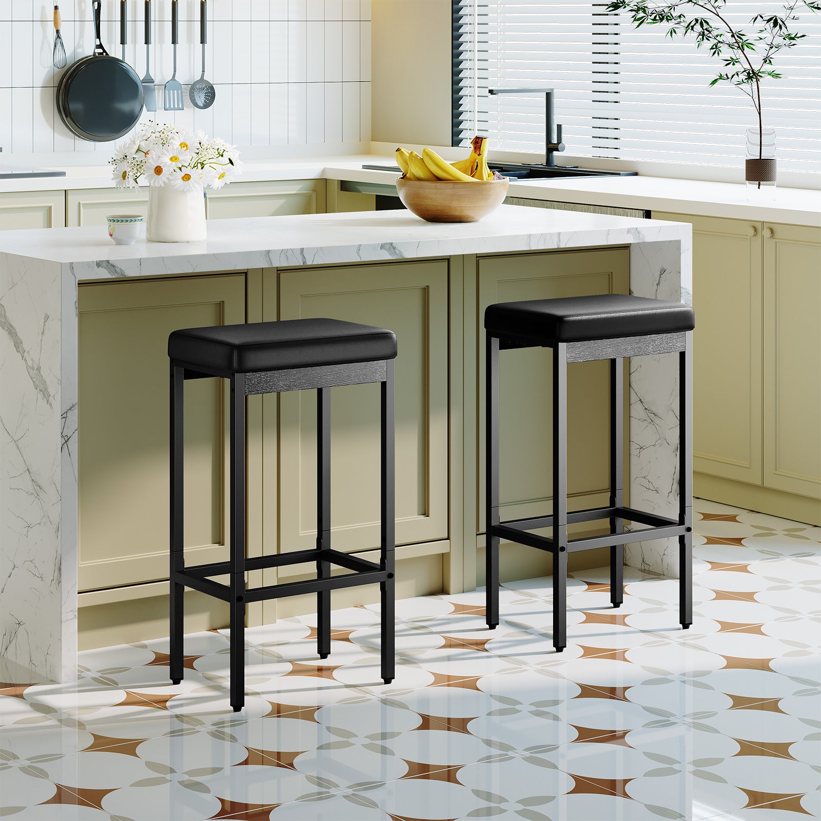 Upholstered black PU leather barstools tucked under a luxury marble kitchen counter.