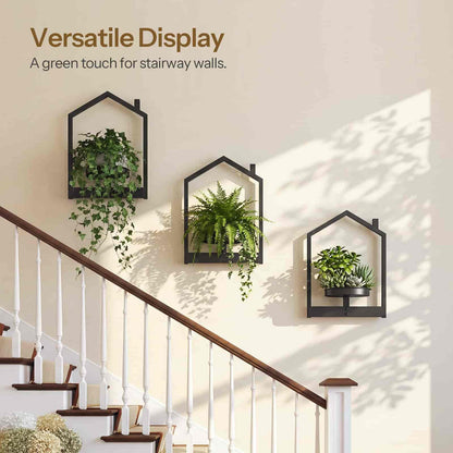 Three wall-mounted planters with plants on a staircase wall, labeled 'Versatile Display'.