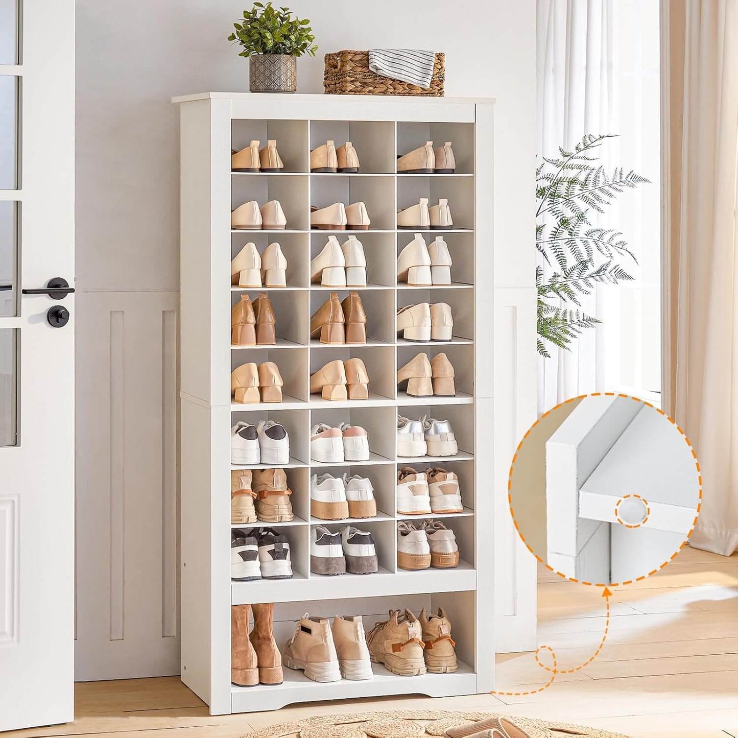 Large 9-tier white shoe storage cabinet with 24 individual compartments standing in a spacious entryway.