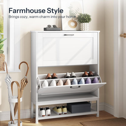 White farmhouse style shoe tower with an open bucket drawer placed next to an open front door in a bright mudroom.